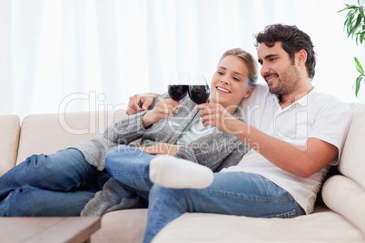 Couple having a glass of red wine