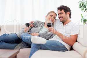 Couple drinking a glass of  red wine