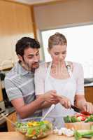 Portrait of a couple cooking