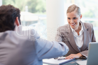 Manager interviewing a male applicant