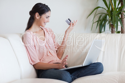 Happy woman shopping online