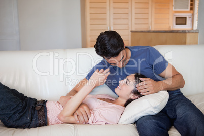 Young couple cuddling each other