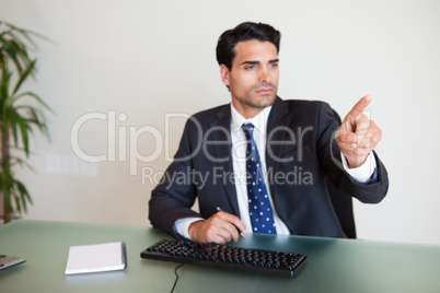 Businessman pointing at something