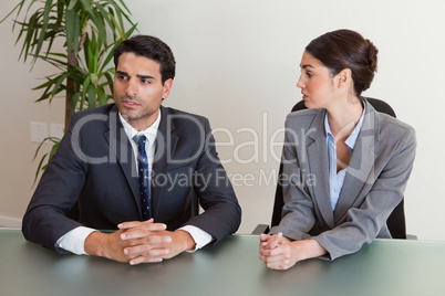 Focused business people negotiating