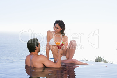 Lovely couple having a cocktail