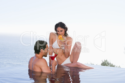 Charming couple having a cocktail