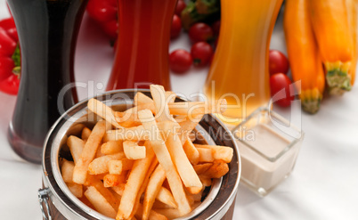 fresh french fries on a bucket