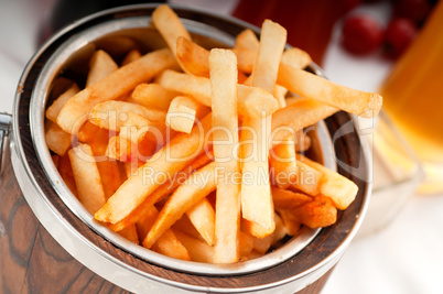 fresh french fries on a bucket