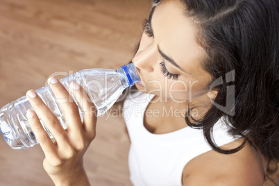 Latina Hispanic Woman Girl Drinking Water Bottle at Gym