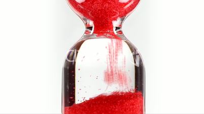 Hourglass with red pearls - Time Lapse