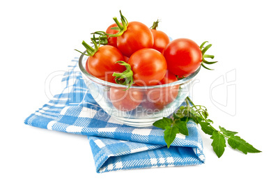 Tomatoes in a glass on a napkin