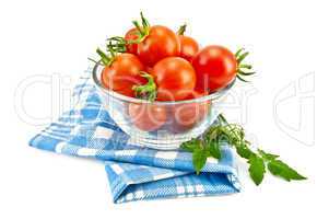 Tomatoes in a glass on a napkin