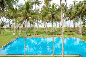 The swimming pool and beach of luxury hotel, Bentota, Sri Lanka