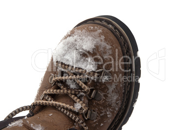 Snow-covered hiking boot