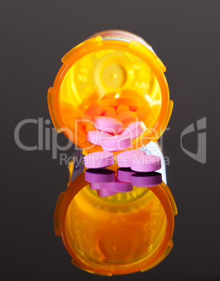 Purple pills from orange drug bottle