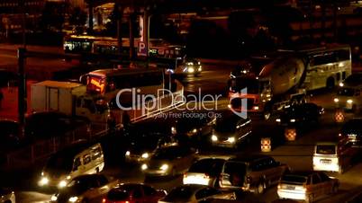 Many cars on road,traffic jam at night,crossroads,junctions.
