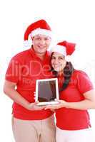 Couple enjoying their new touchpad on christmas