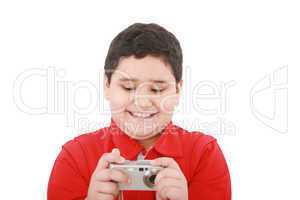 small boy with digital camera on white background