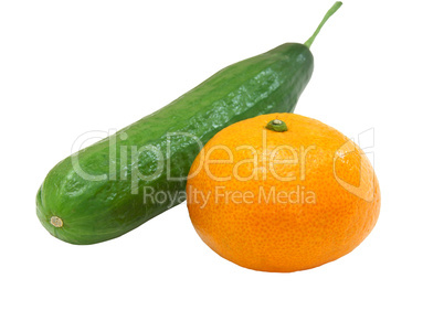 The fresh green cucumber with a tangerine