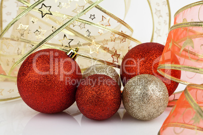 Gold and red Christmas baubles.