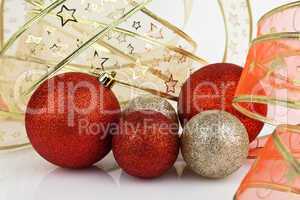 Gold and red Christmas baubles.