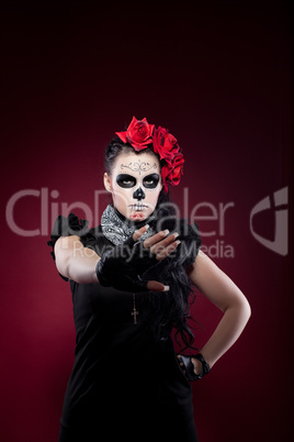 funny woman in day of the dead mask stop sign