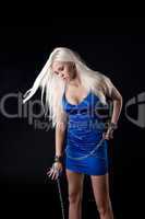 Beautiful blond girl stamd in blue cloth