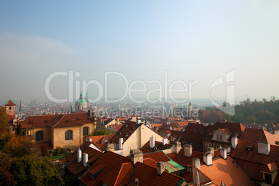 Old Prague roofs at autumn morning