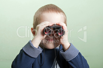 Child with binoculars