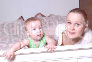 Mother and child are watching tv, family scenes