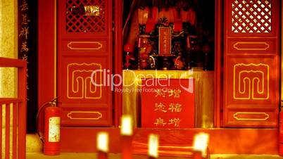 Taoist statues Buddha in door,Burning incense in Incense burner,Wind of smoke.