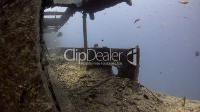 Scuba divers POV diving a shipwreck