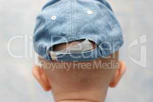 Back of child head and cap