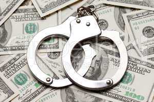 Handcuffs on dollar currency