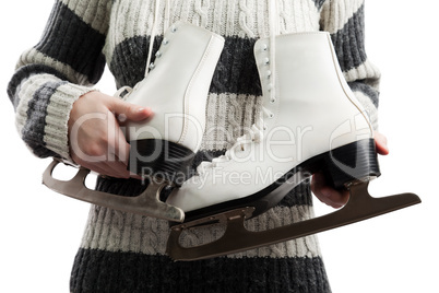 Women holding ice skates