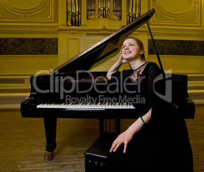 Dreamy smiling pianist
