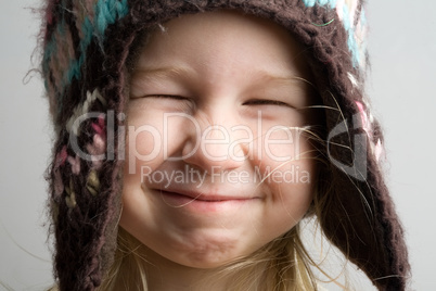 funny girl in winter hat