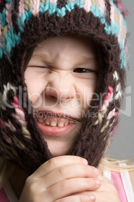 funny girl in winter hat