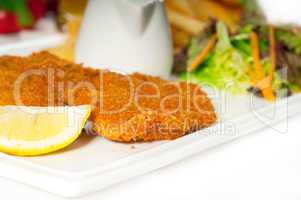 classic Milanese veal cutlets and vegetables