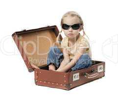 little girl in suitcase