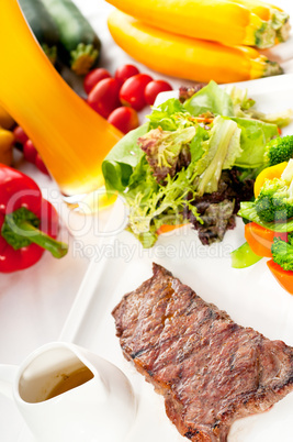 juicy BBQ grilled rib eye ,ribeye steak and vegetables