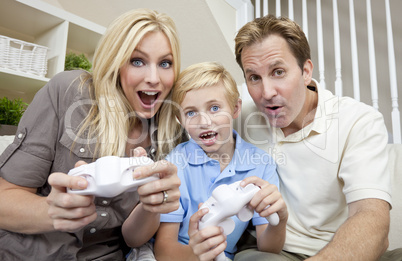 Family Having Fun Playing Video Console Game