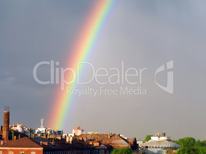 Rainbow multi color image in blue sky rain nature