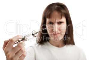 Women holding injecting syringe