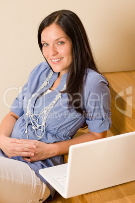 Home living happy woman with laptop staircase