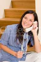 Home living woman call phone sitting staircase