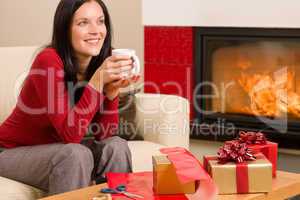 Christmas present wrap woman drink home fireplace