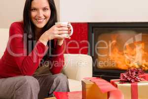 Christmas present wrap woman drink home fireplace