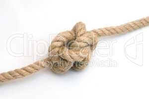 Tied up rope knot isolated on a white background