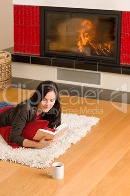 Home fireplace happy woman read book winter